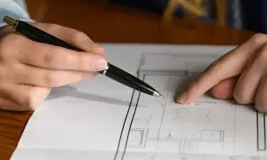 Rysunek techniczny z zaznaczonymi wymiarami, pomocny w tym, jak obliczyć metry kwadratowe pokoju do malowania.