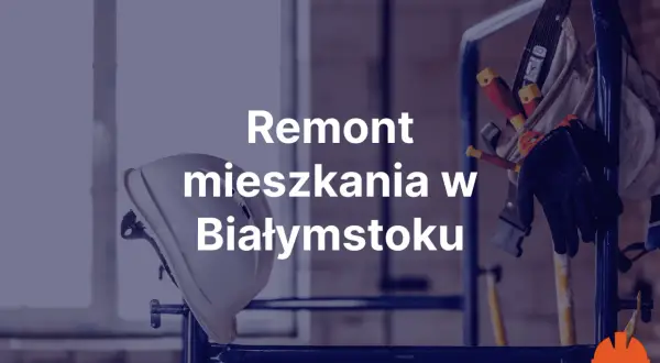 Biały kask budowlany i narzędzia na rusztowaniu.
